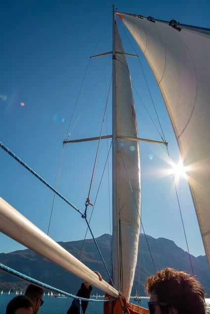 Sailing boat trip with skipper and sunset aperitif from Riva del Garda 24