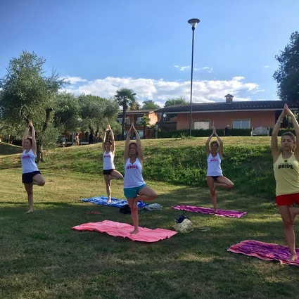 Yoga group lesson outdoors with a view on Lake Garda 3