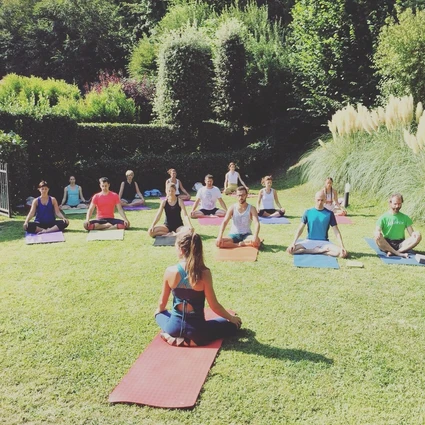 Yoga group lesson outdoors with a view on Lake Garda 15