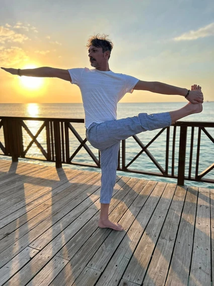 Group yoga lesson at dawn on terrace facing Lake Garda in Bardolino 7