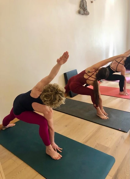 Group yoga lesson in studio at Lonato del Garda 4
