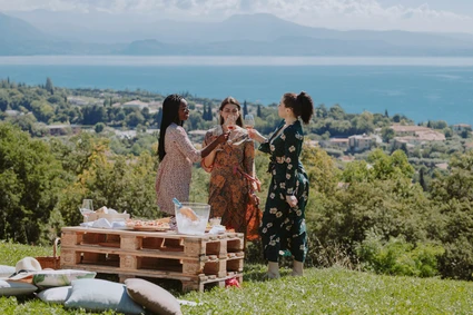 Outdoor picnic in a wine resort at Lake Garda 0