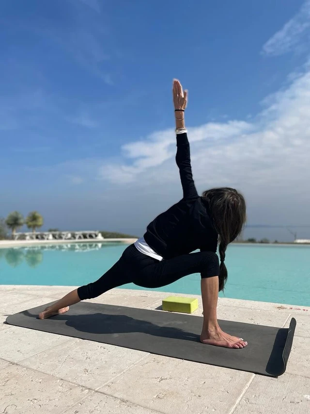Yoga lesson in historic residence with view of Lake Garda